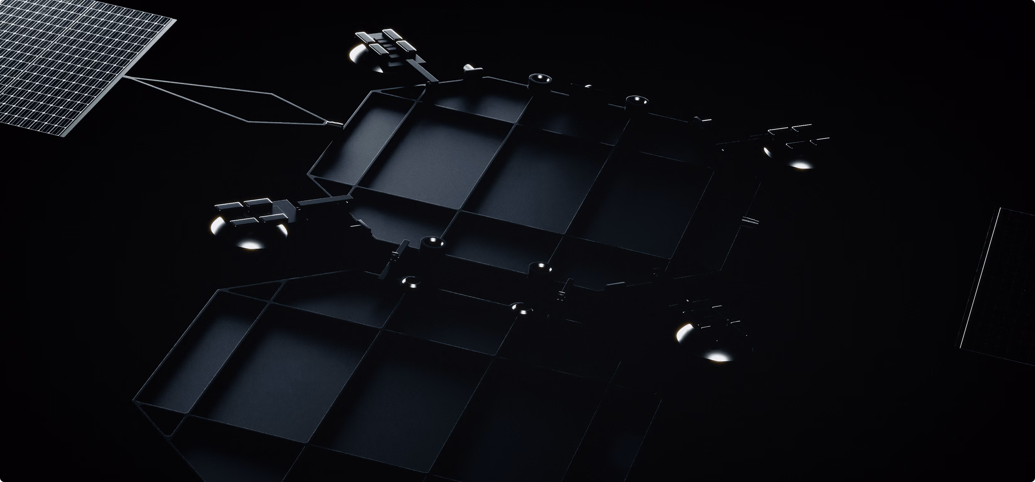 Dark spacecraft with solar panels extending from its sides floating in space.