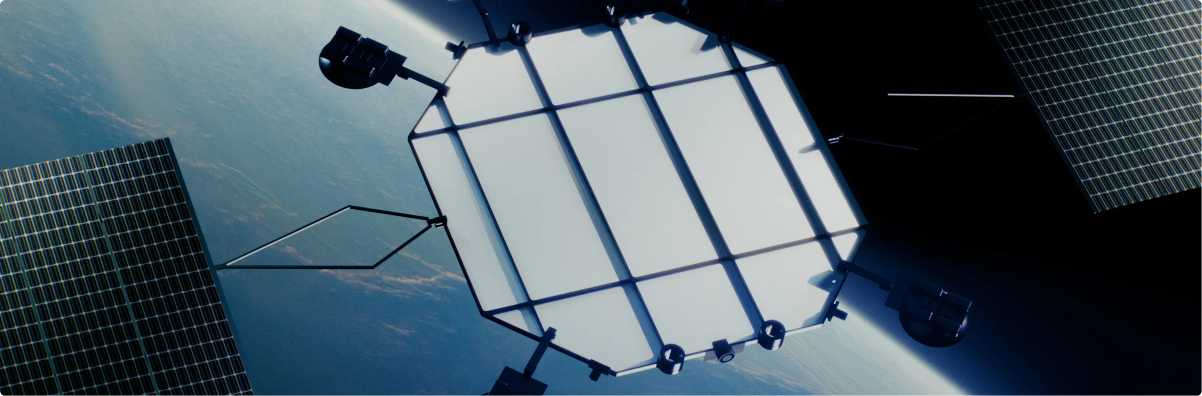 Close-up of a satellite's solar panels and reflective surface orbiting above Earth.