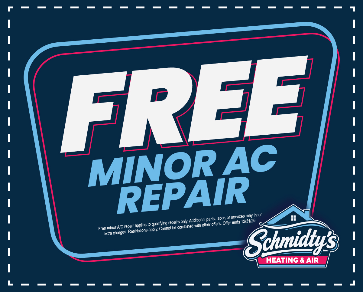 Coupon offering free minor AC repair from Schmidty's Heating & Air with terms and expiration date.