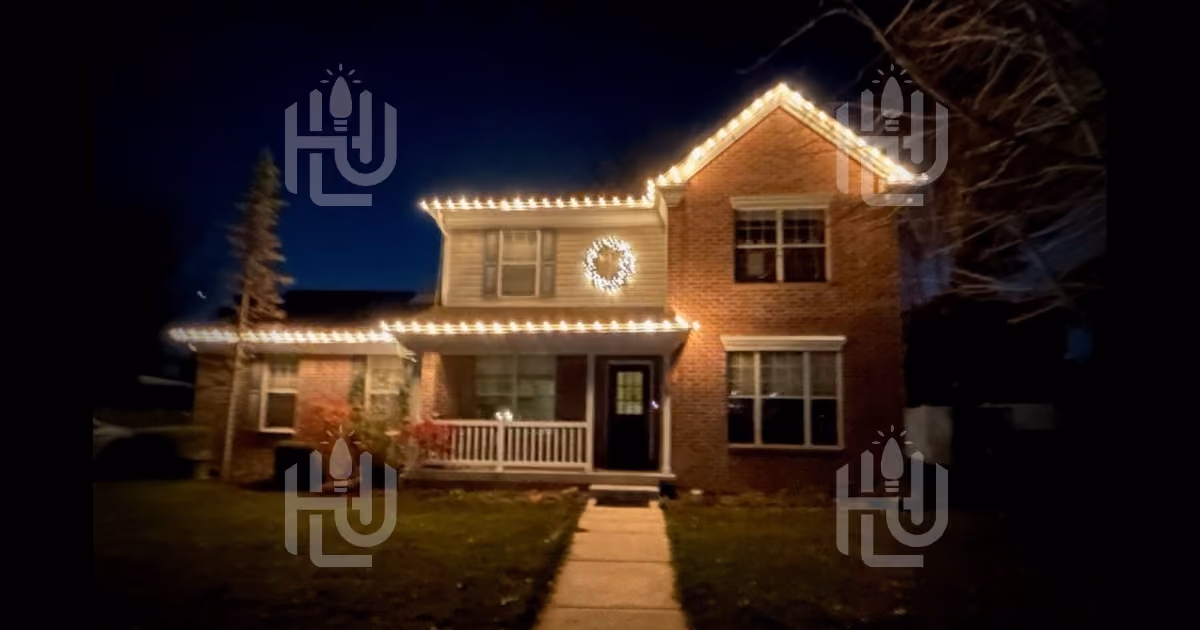 Residential roofline Christmas light installation by a student installer