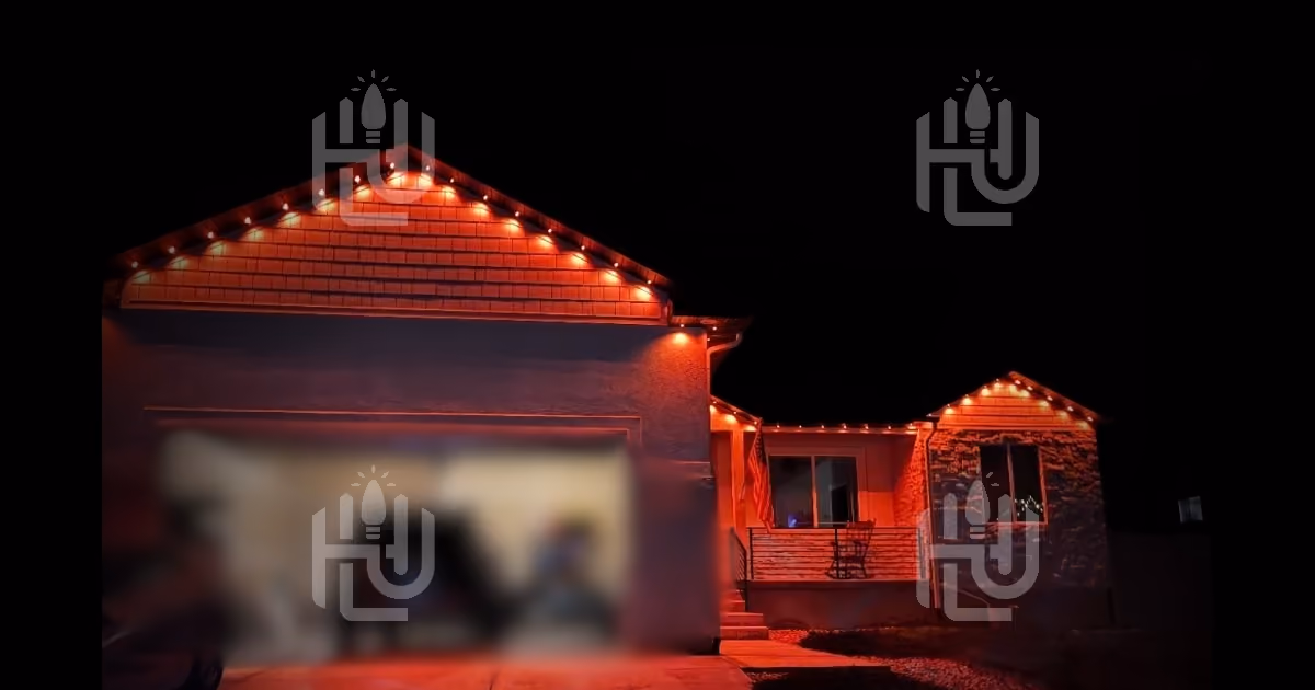 Home decorated with professionally installed holiday lights by a student