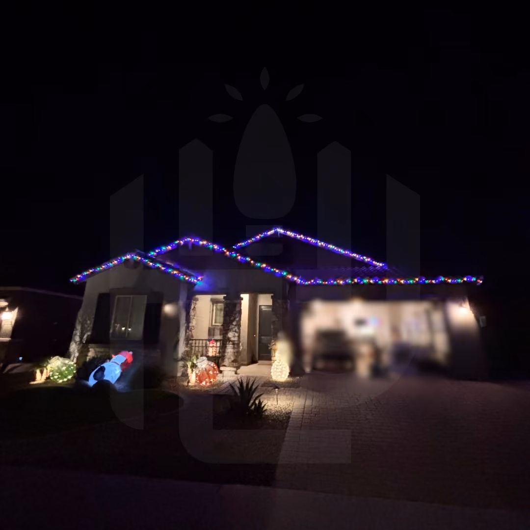 Exterior holiday light installation designed for a residential property