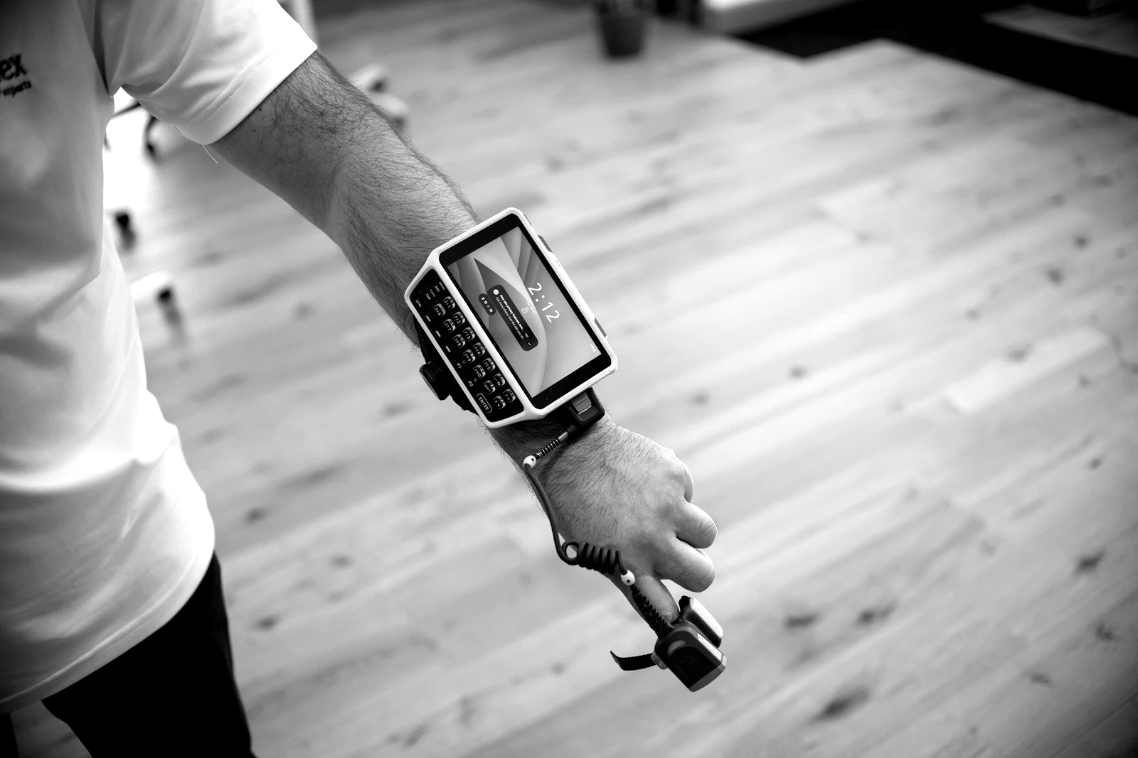 Warehouse worker using a wrist-mounted barcode scanner