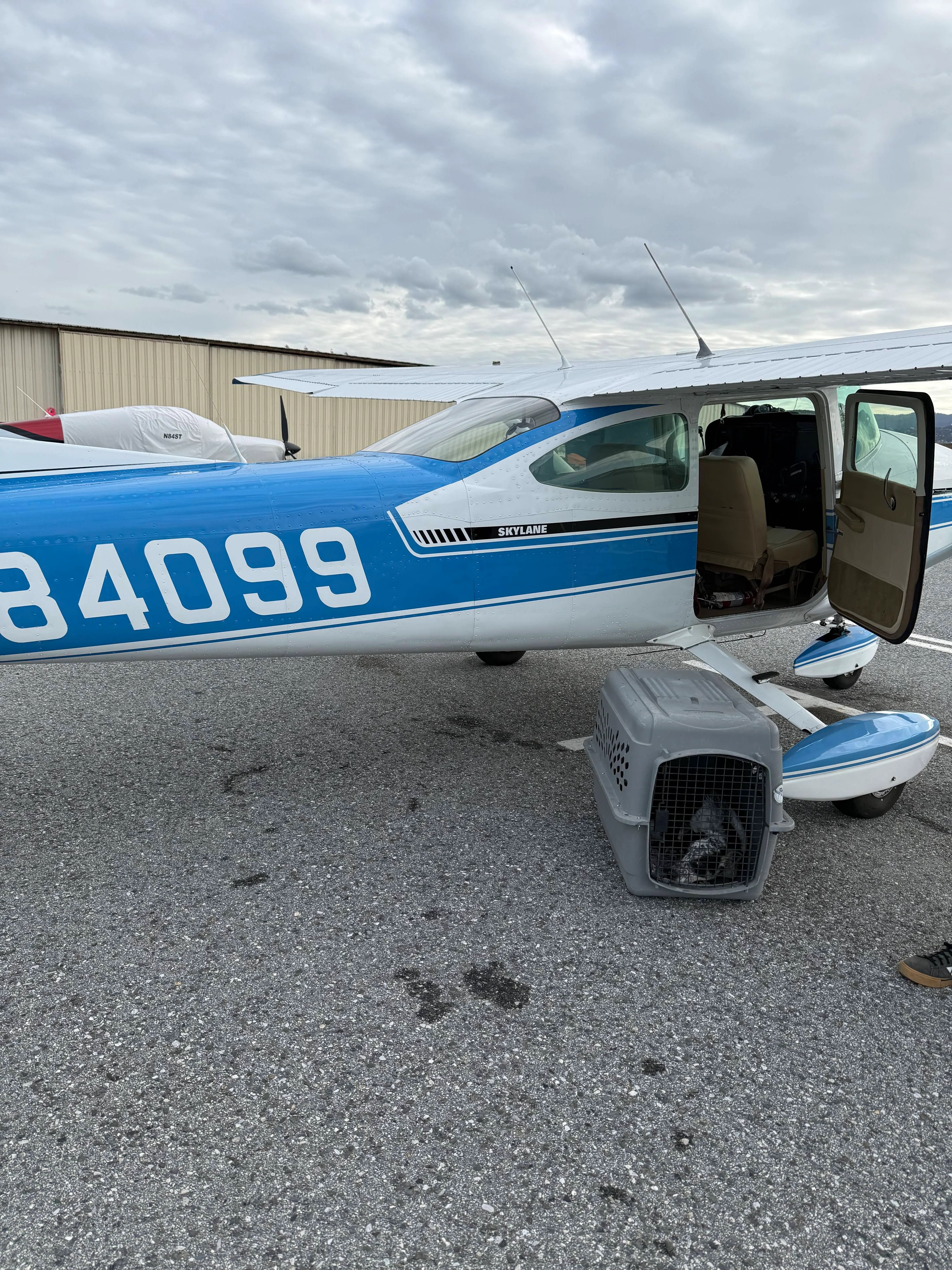 Cessna 182 Skylane N84099 on the ramp with the passenger door open