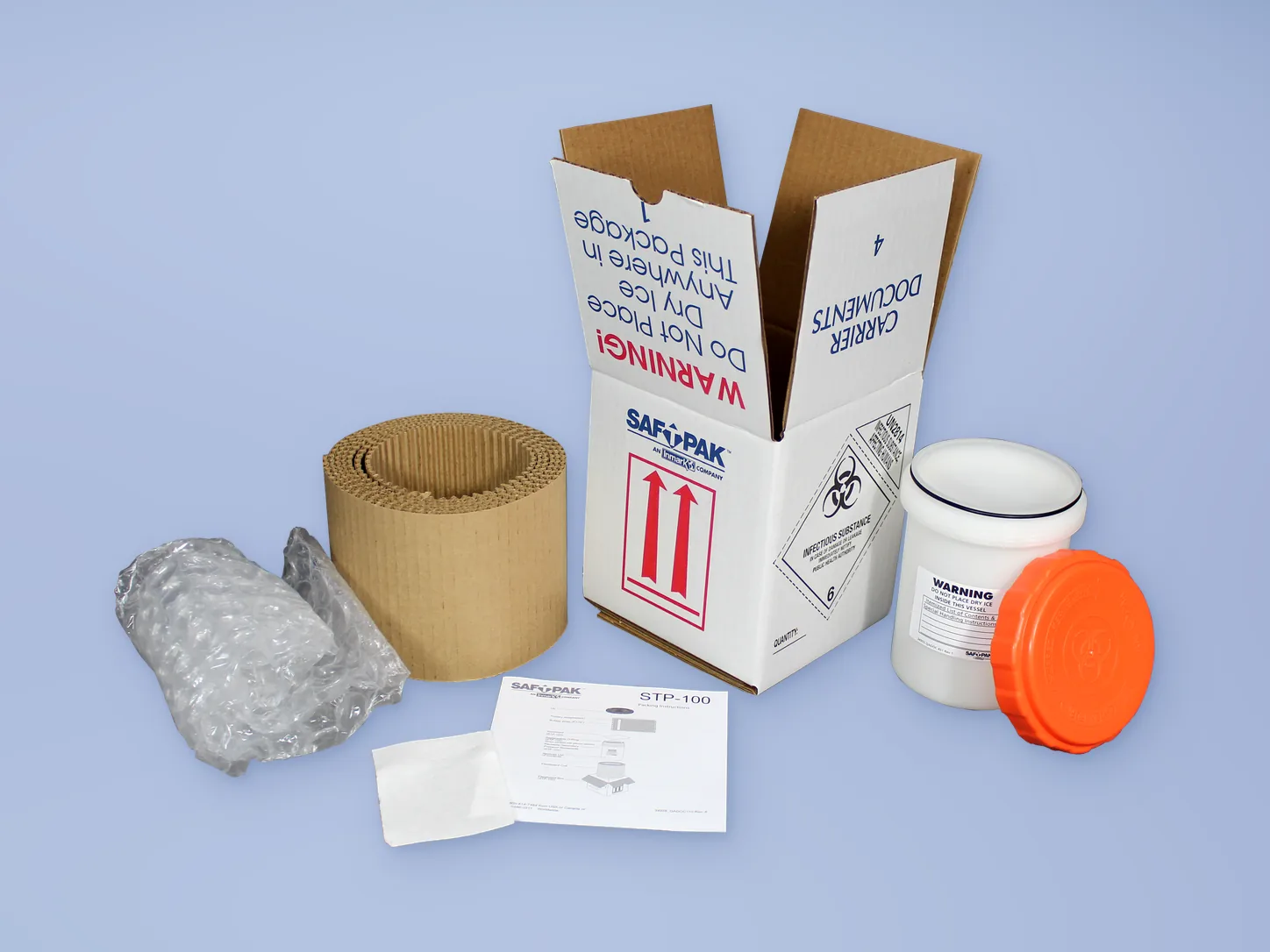 Saf-T-Pak STP-340-OVPK overpack system with kraft outer carton, insulated foam cooler and lid, and overpack, dry ice and infectious substance labels
