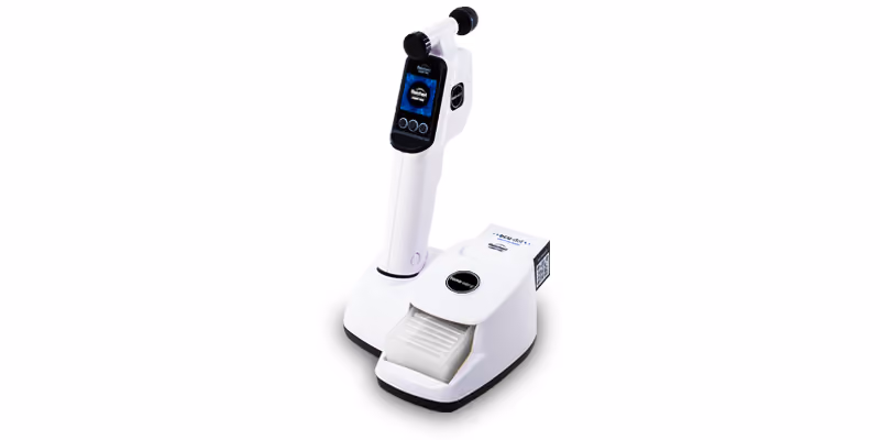 An device to measure eye pressure, white device on back background