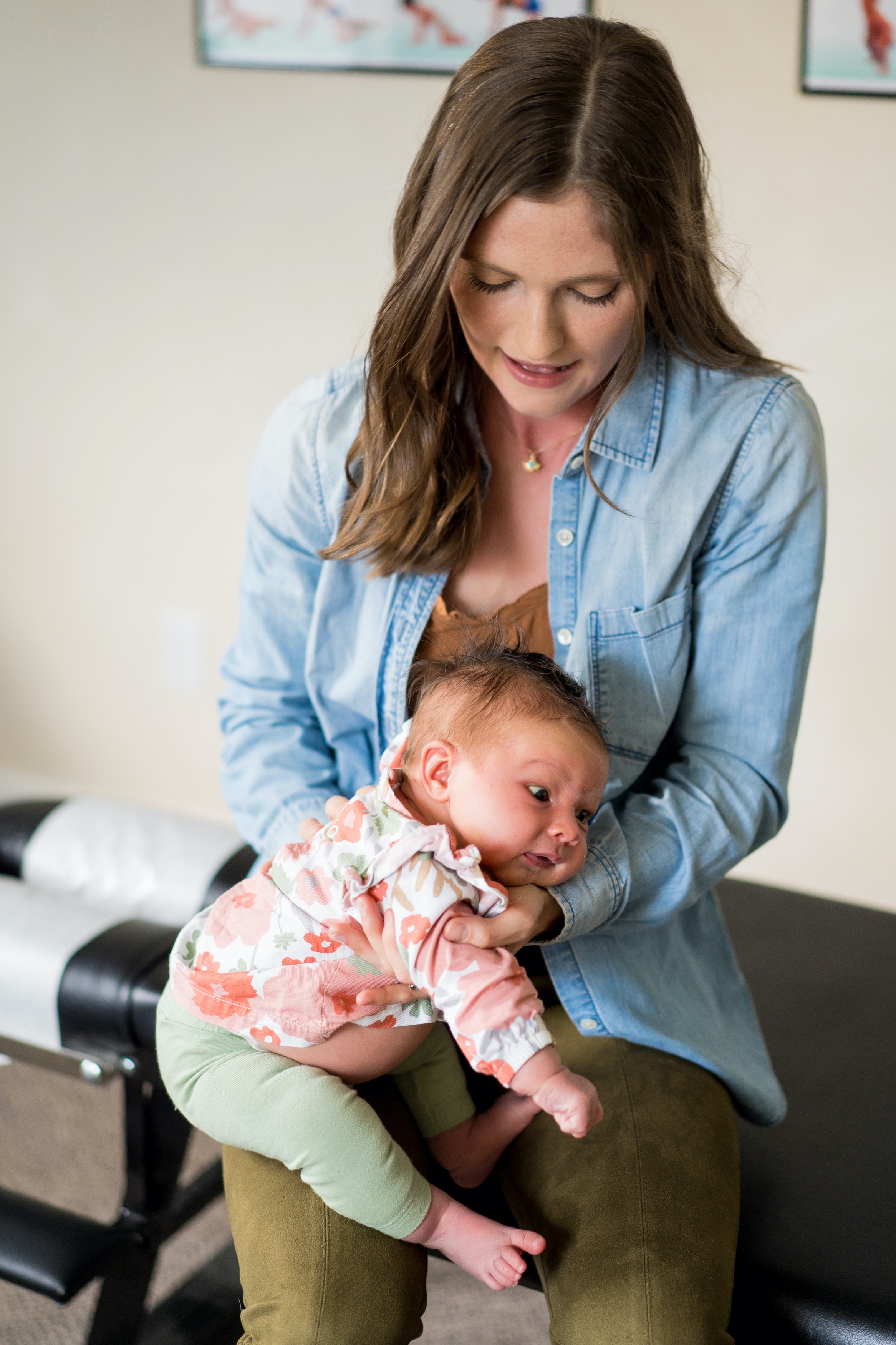 Dr. Hannah adjusting a baby