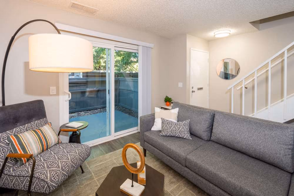 Living area wth sofa and lamp