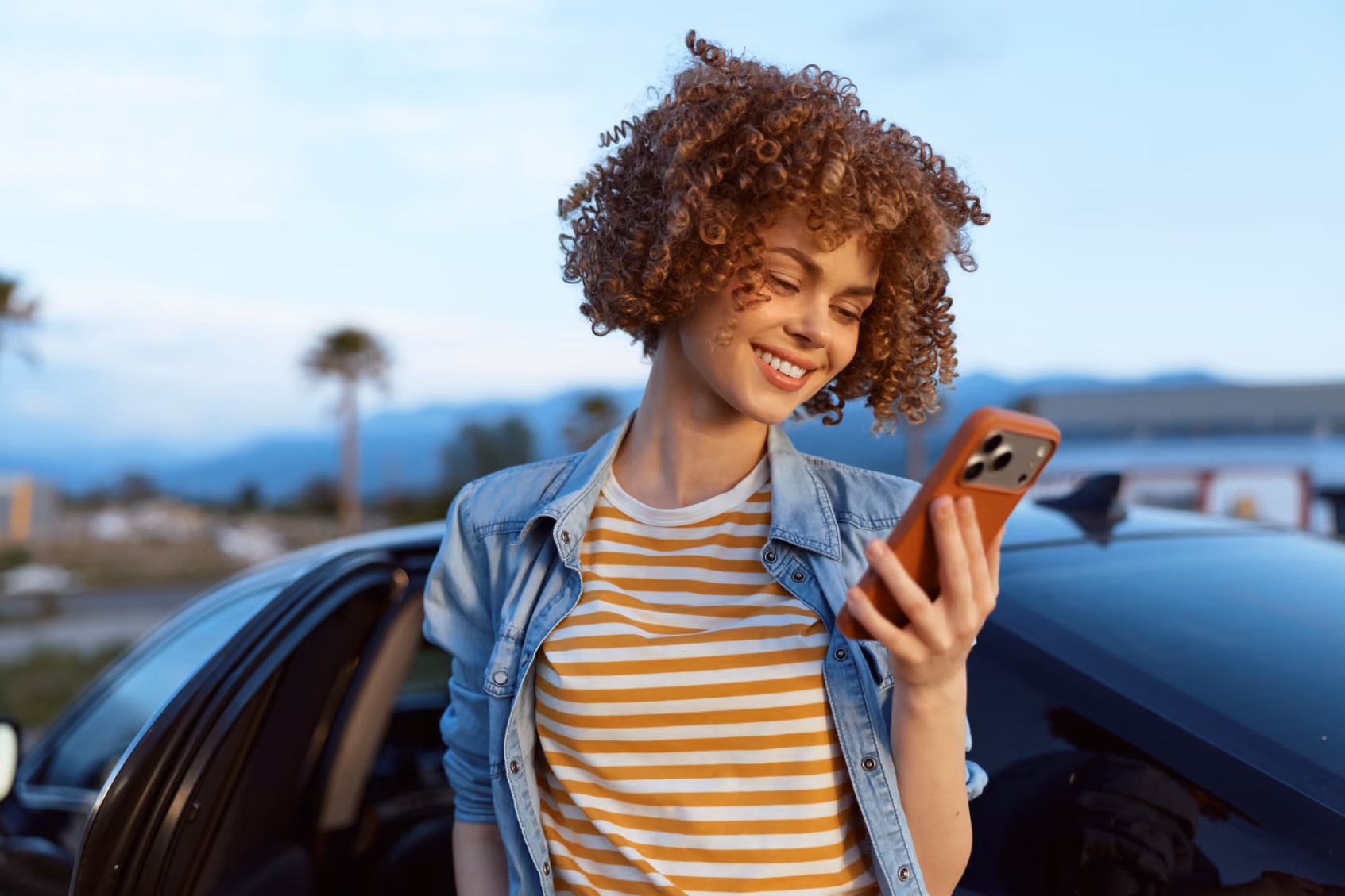 Girl looking at phone stock image