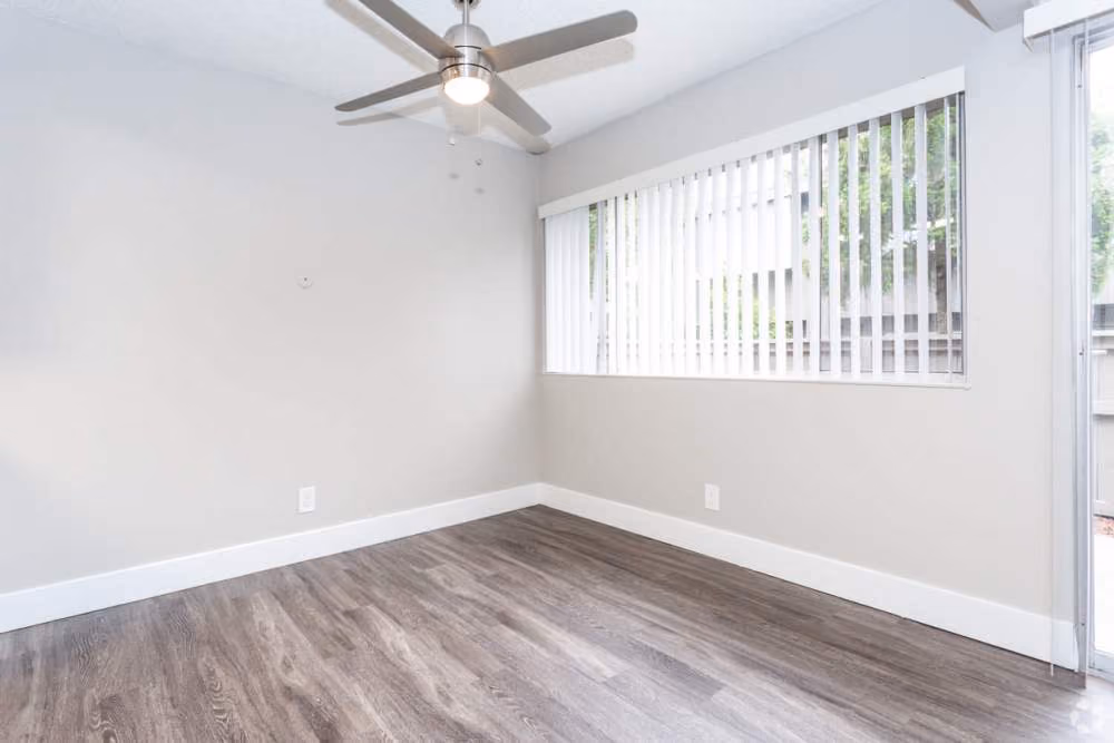 Unfurnished bedroom with large window