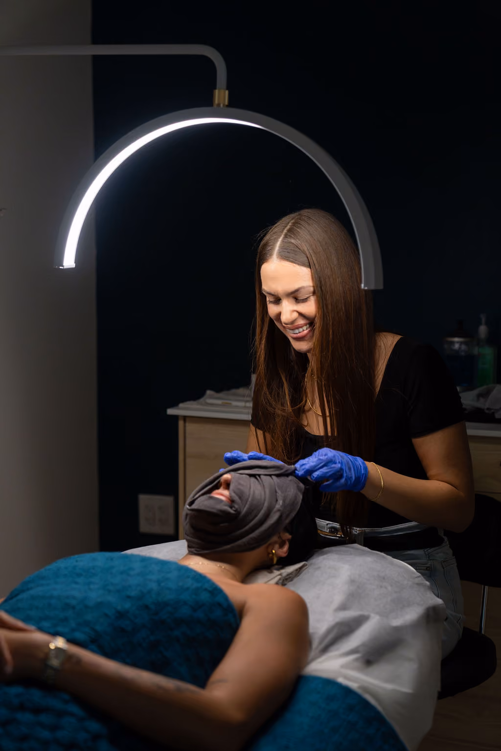 Licensed specialist performing a customized facial at Mod Facial and Massage