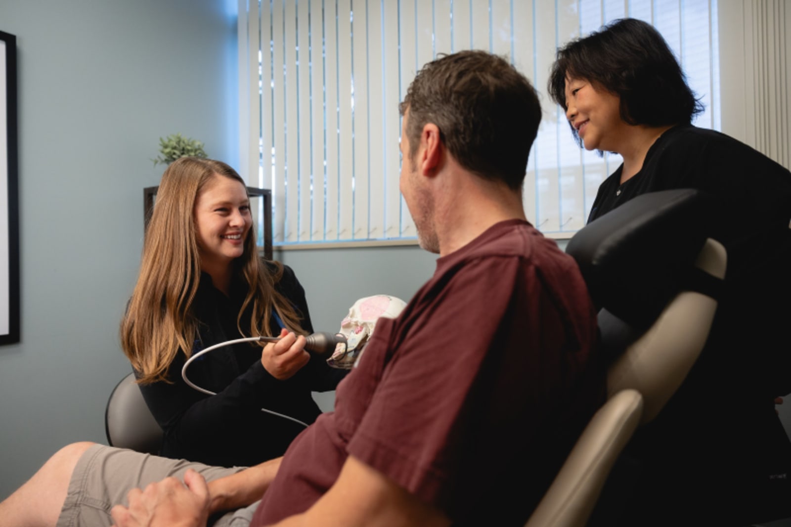 Healthcare provider in consultation with patient, discussing treatment and building trust