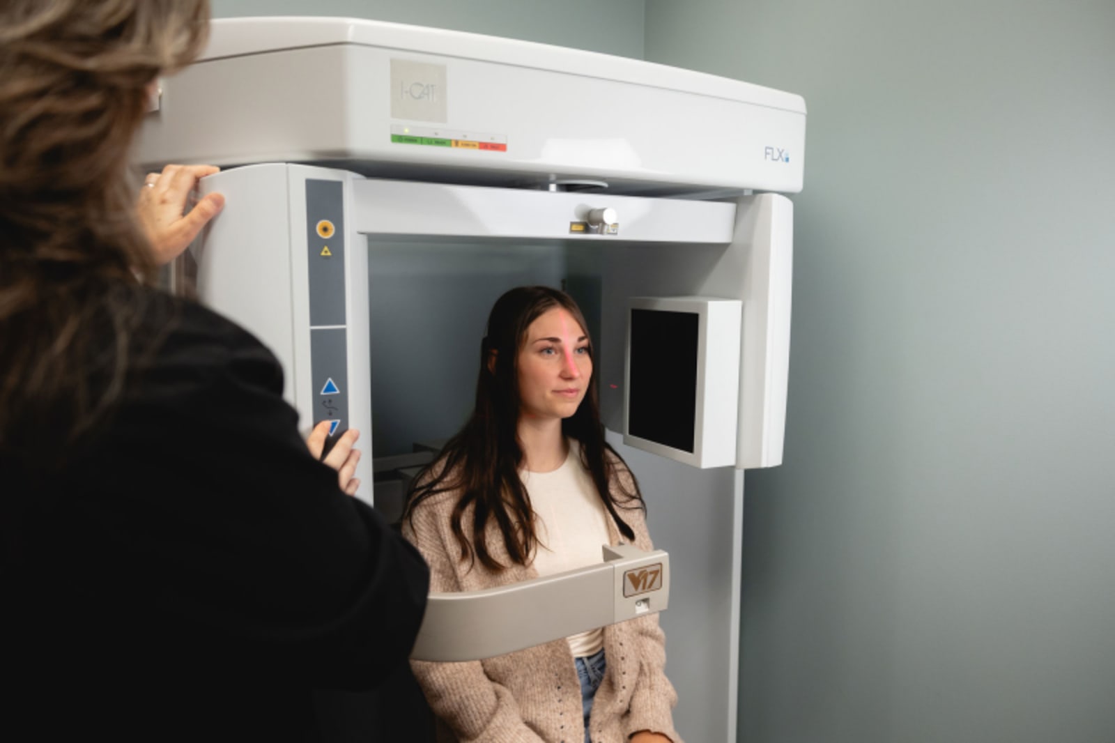Patient undergoing panoramic X-ray imaging during dental evaluation at Minnesota Craniofacial Center.