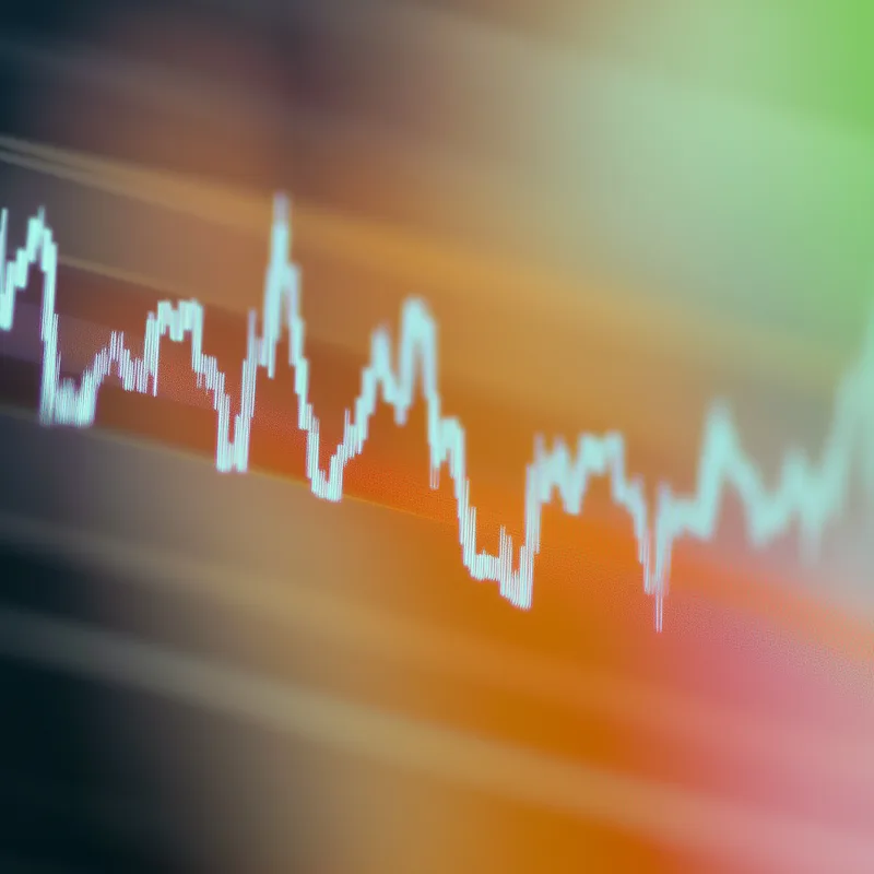 Digital graph or waveform in vibrant blue and orange tones.