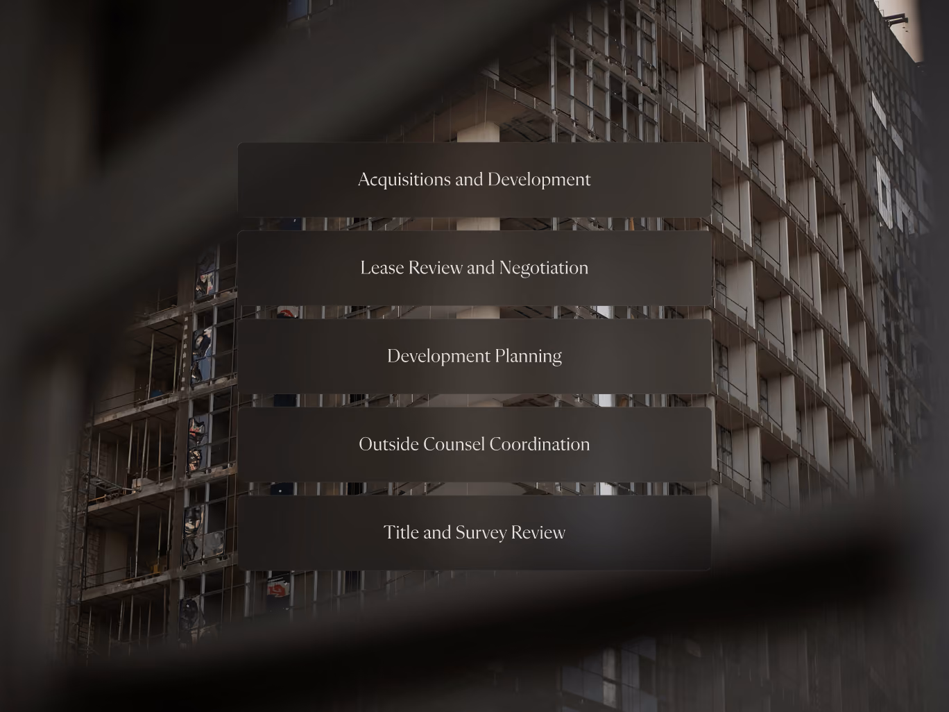 Construction site with text overlay listing commercial real estate services like acquisitions and lease review.