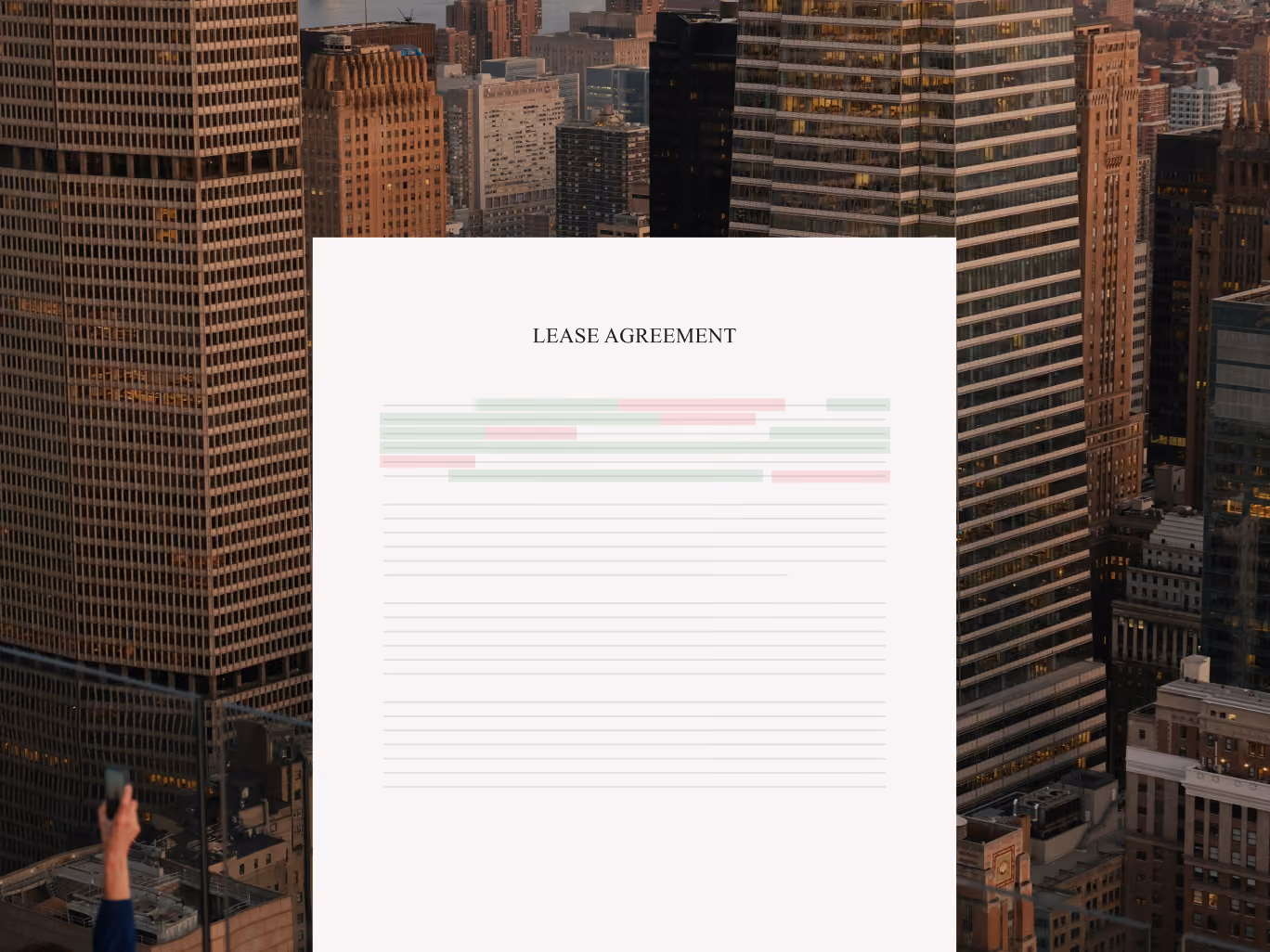 Lease agreement document with highlighted text lines displayed over city skyscrapers at sunset.