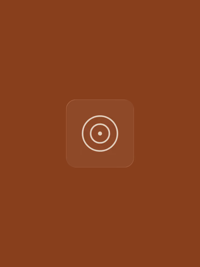 Minimalist icon with concentric circles and a dot in the center on a brown background.
