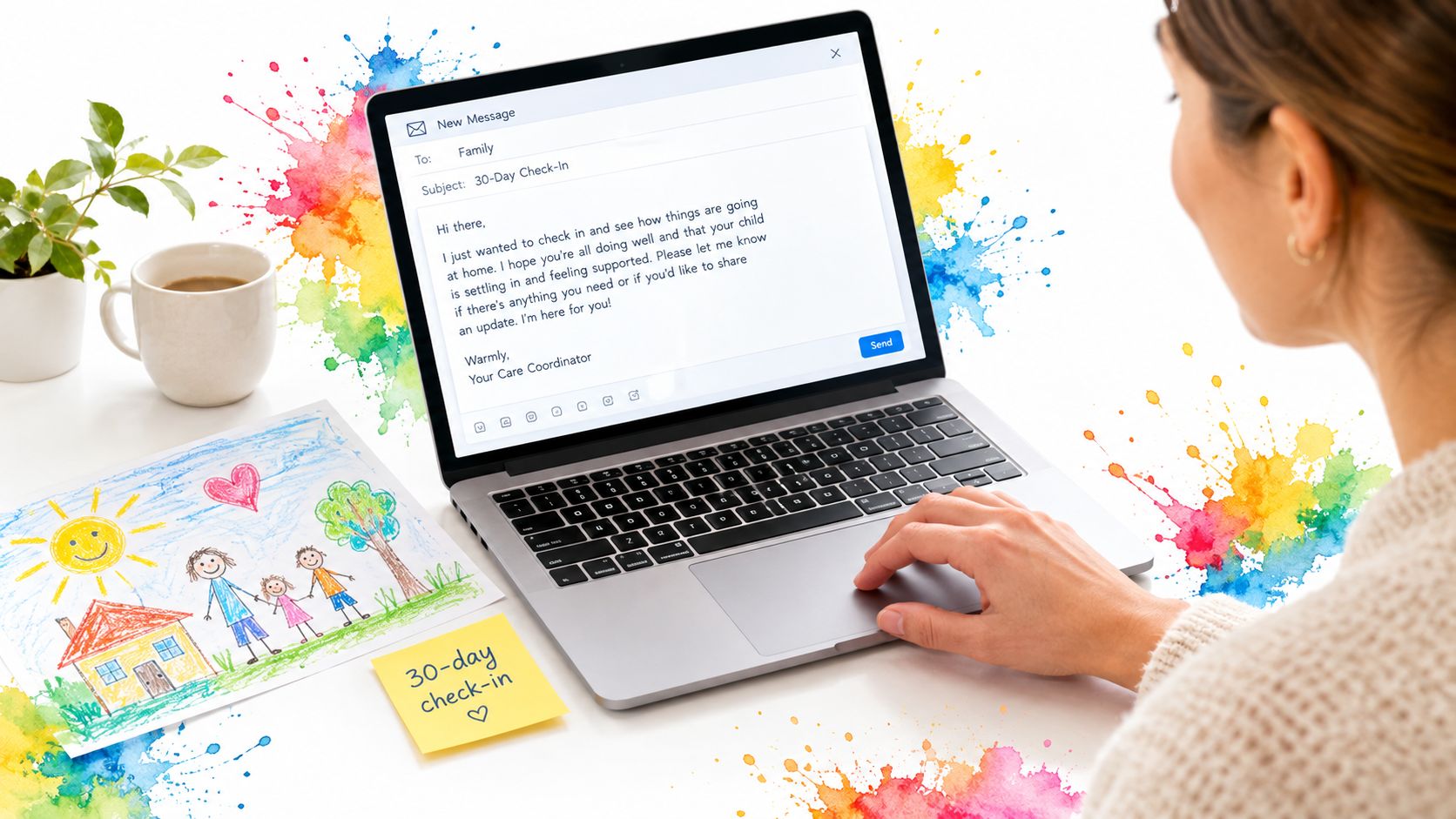 A care coordinator writes a thirty-day check-in email to a family on a laptop with artistic drawings.