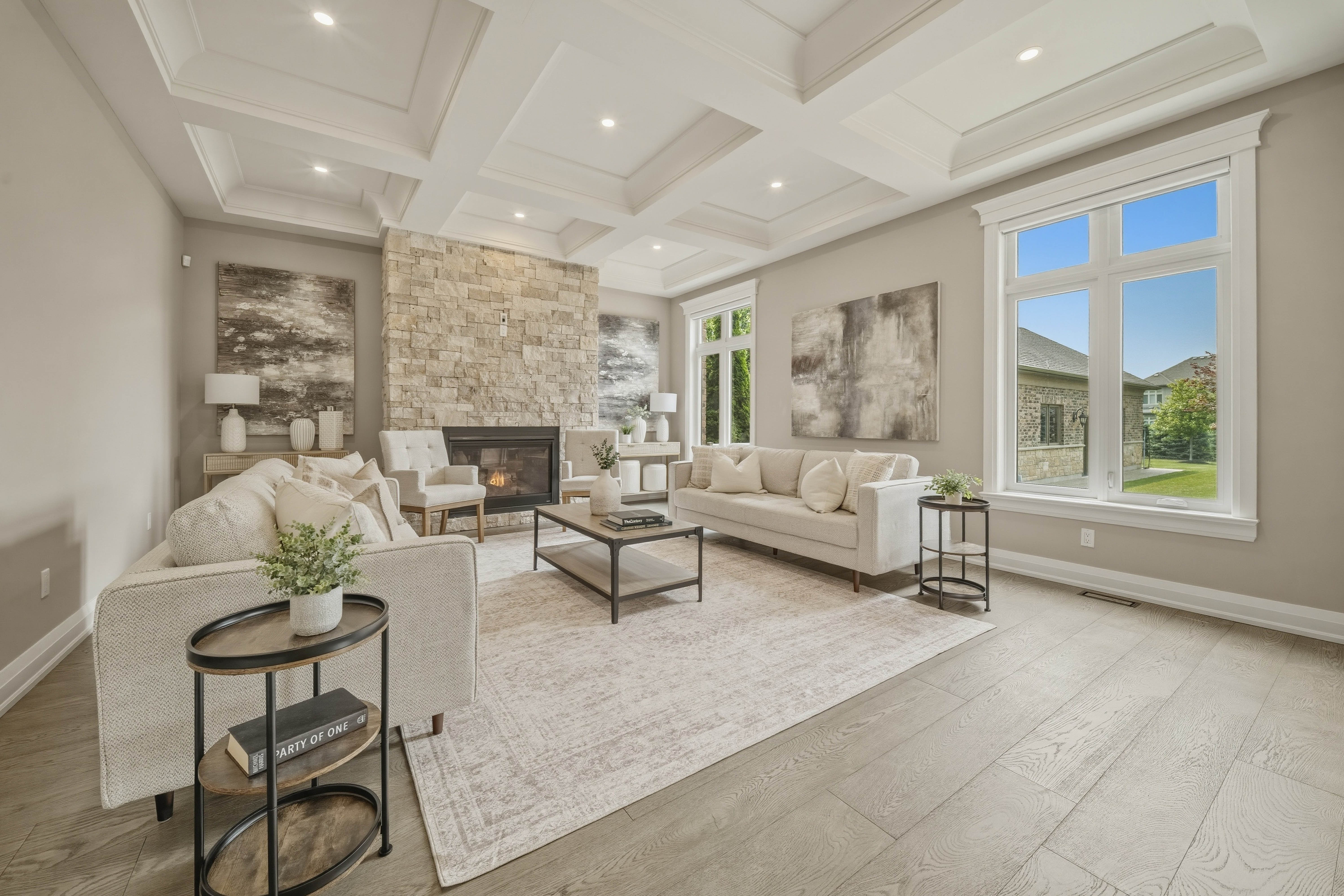 294 Tanbark Road, Niagara-on-the-Lake — great room with coffered ceiling, stone fireplace and full-height windows