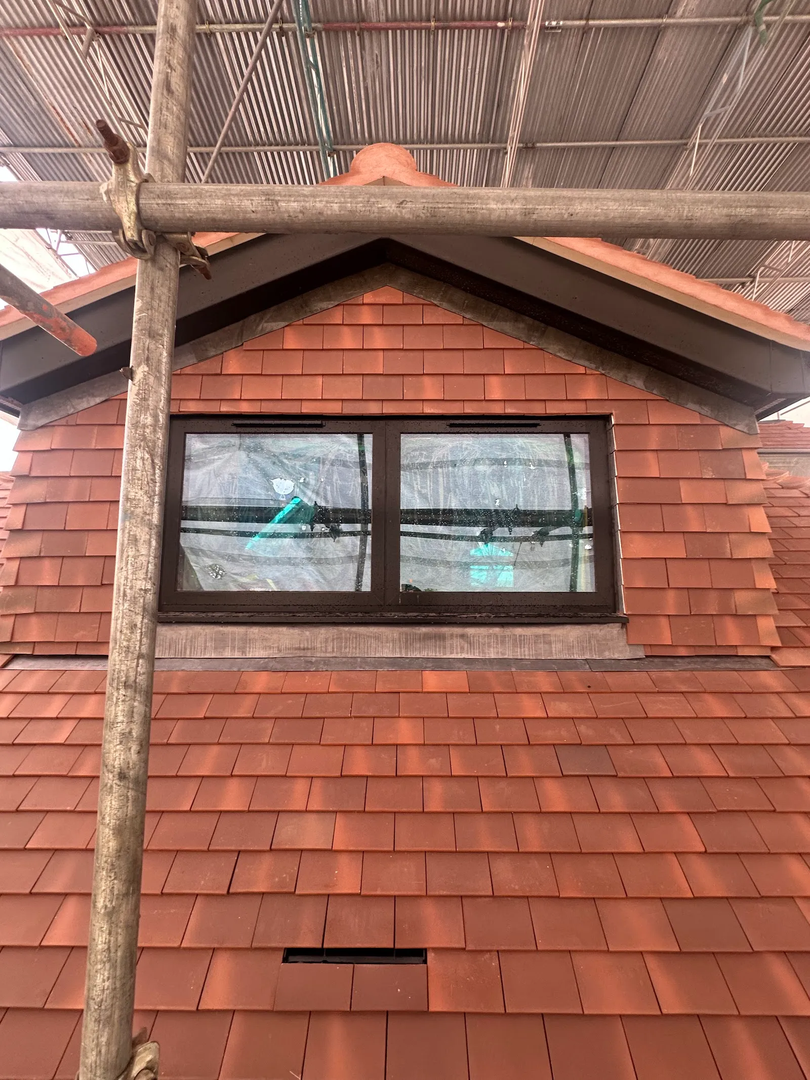 Dormer window fitted with tile hung surround, Southgate loft conversion