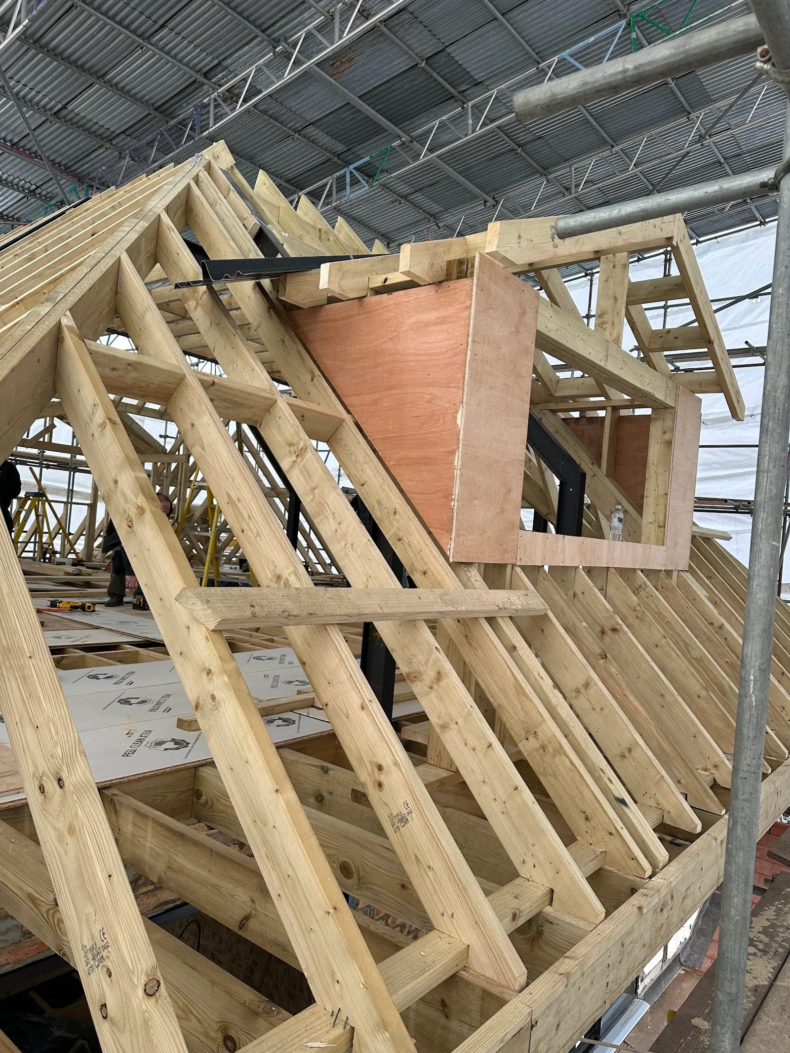 Dormer opening framed in timber during a loft conversion in Southgate N14