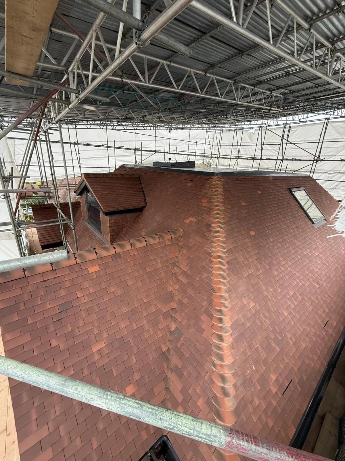 Newly tiled roof and ridge on a Southgate N14 property