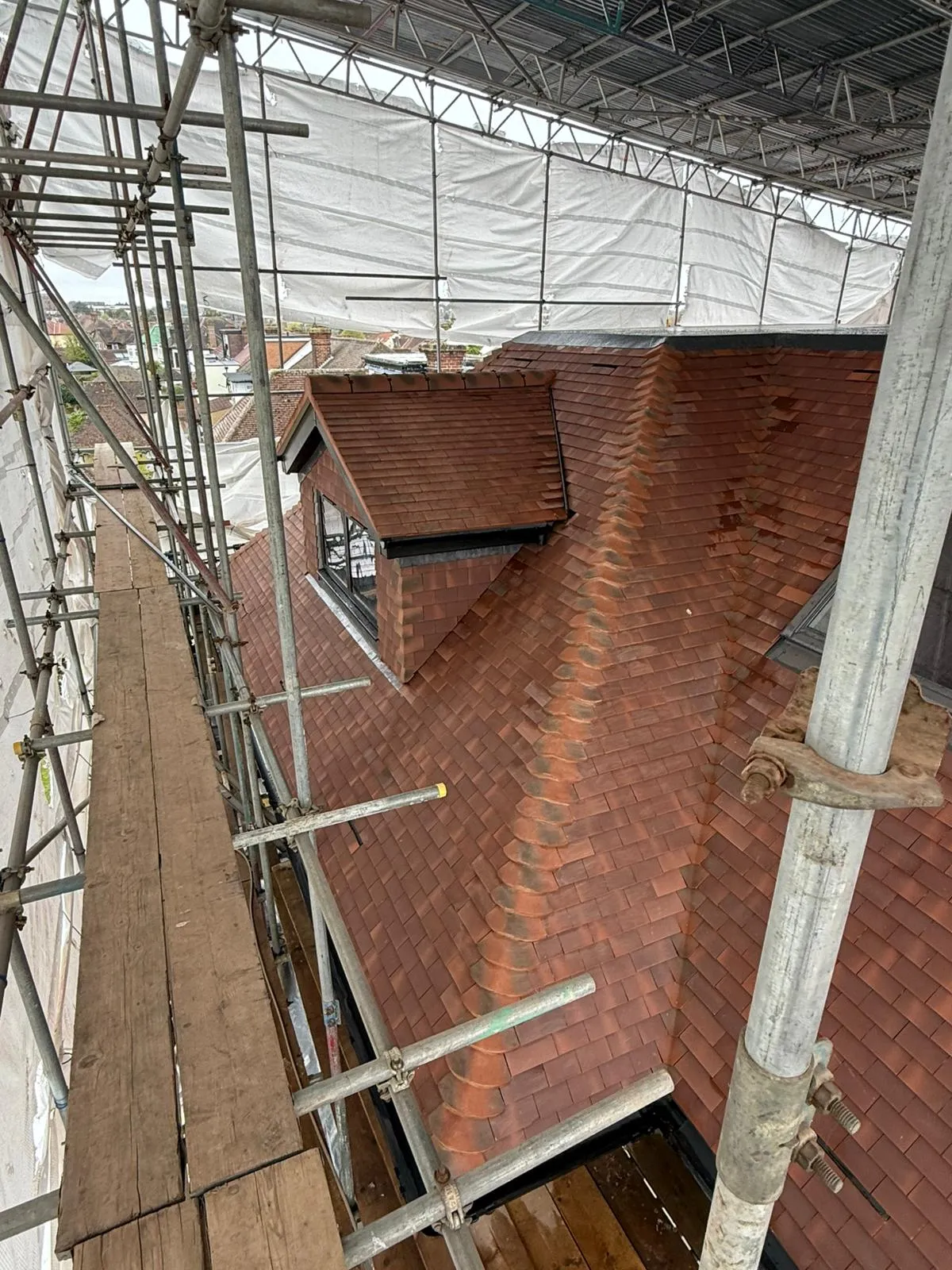 Completed hip roof tiling on a loft conversion in Southgate