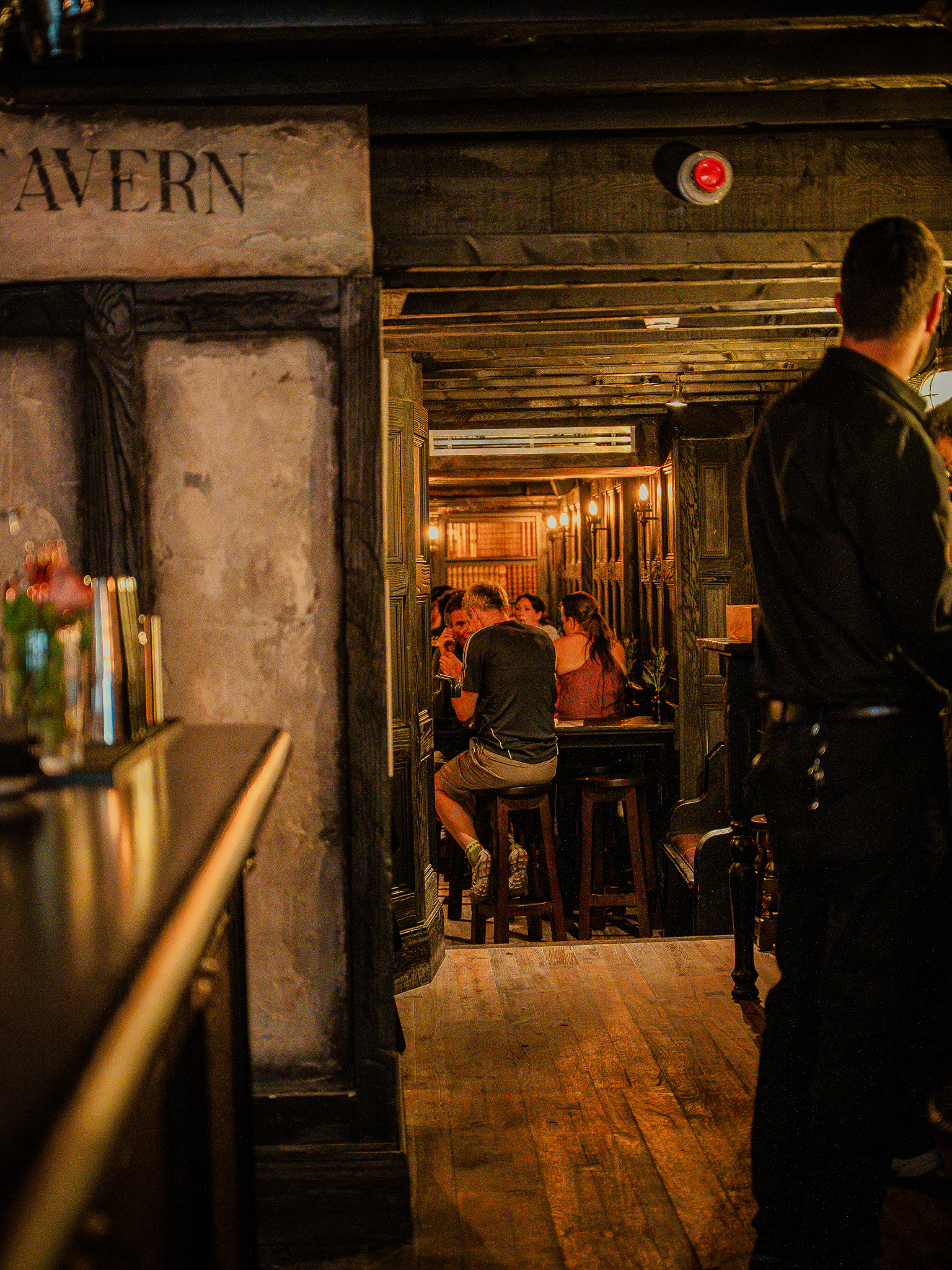 The front bar, brass and timber