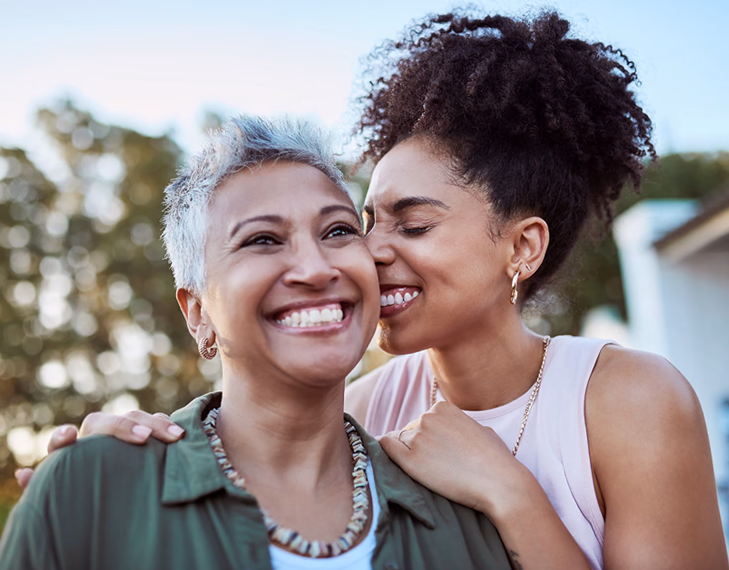 Two woman smiling