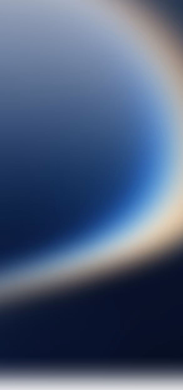 Blurry gradient background with curved transition from dark blue to light gray and white tones.