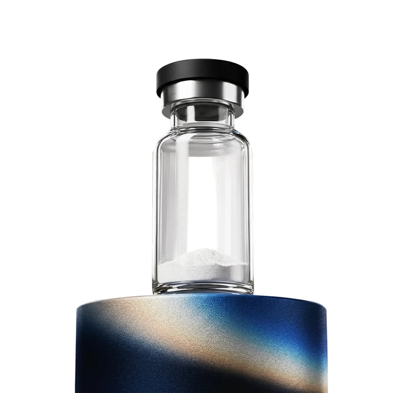 Unlabeled vial with white lyophilized powder at the bottom