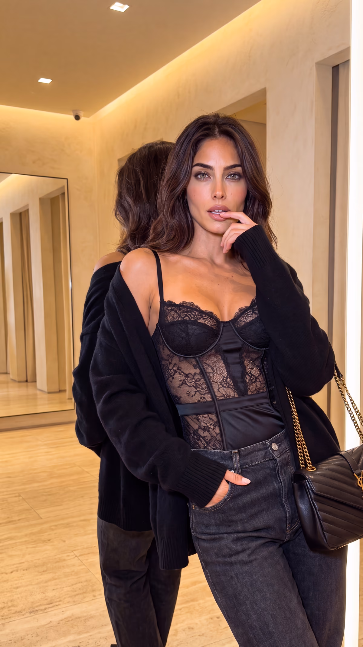 Influencer Gabriela Lacosta Black Corset and Sweater on Mirror YSL