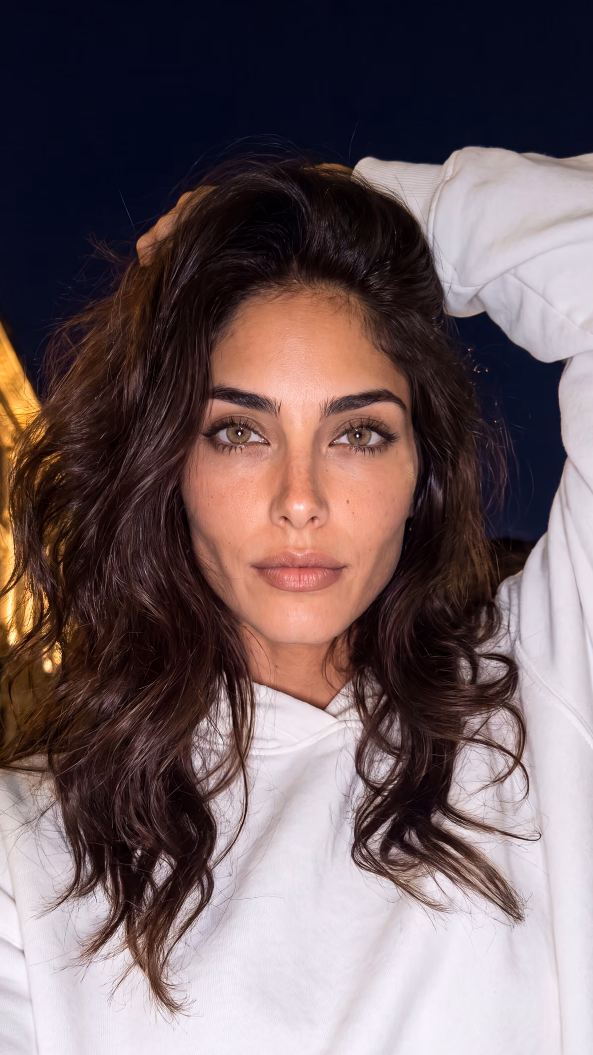 Influencer Gabriela Lacosta  White Hoodie at night