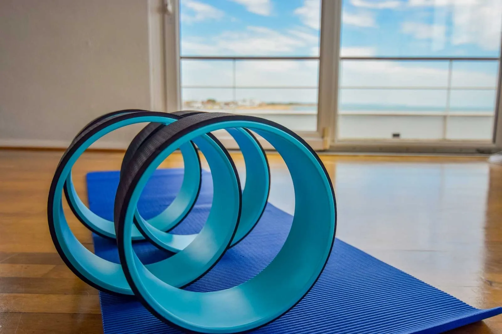 photo of blue exercise rings in studio