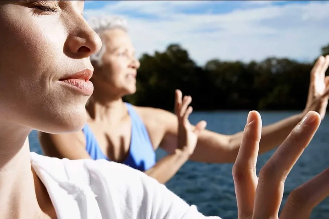photo of two people doing tai chi