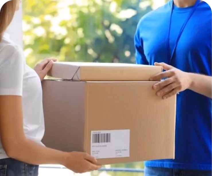 a man and woman holding a box