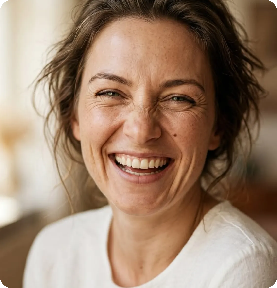 a woman smiling at camera