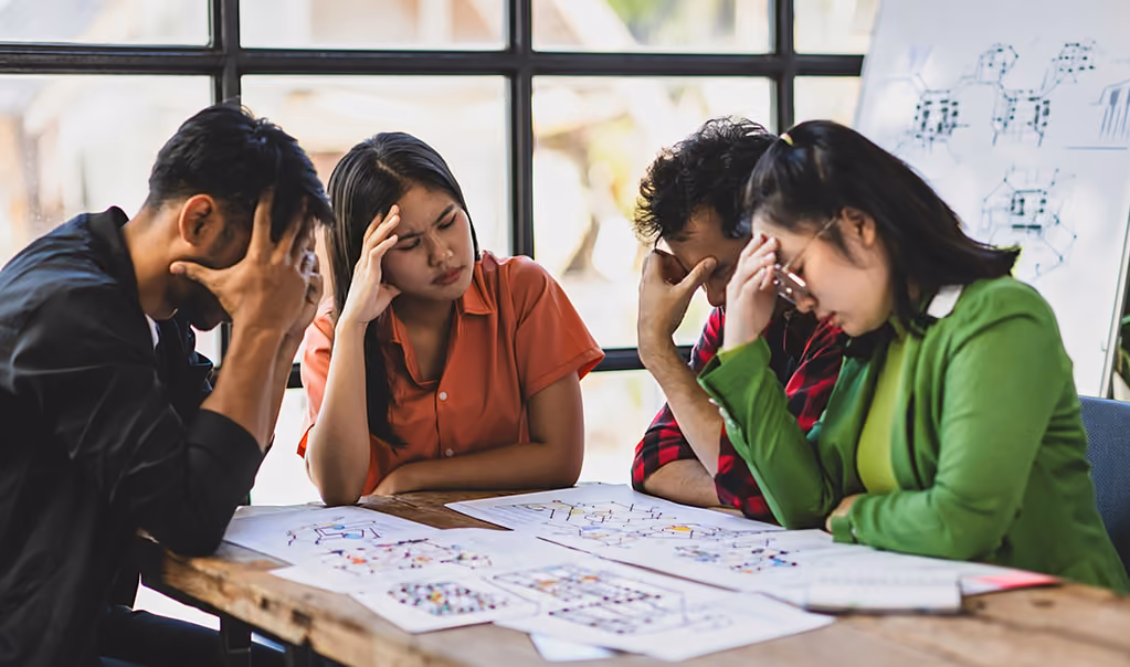 IT professionals discussing complex enterprise infrastructure.