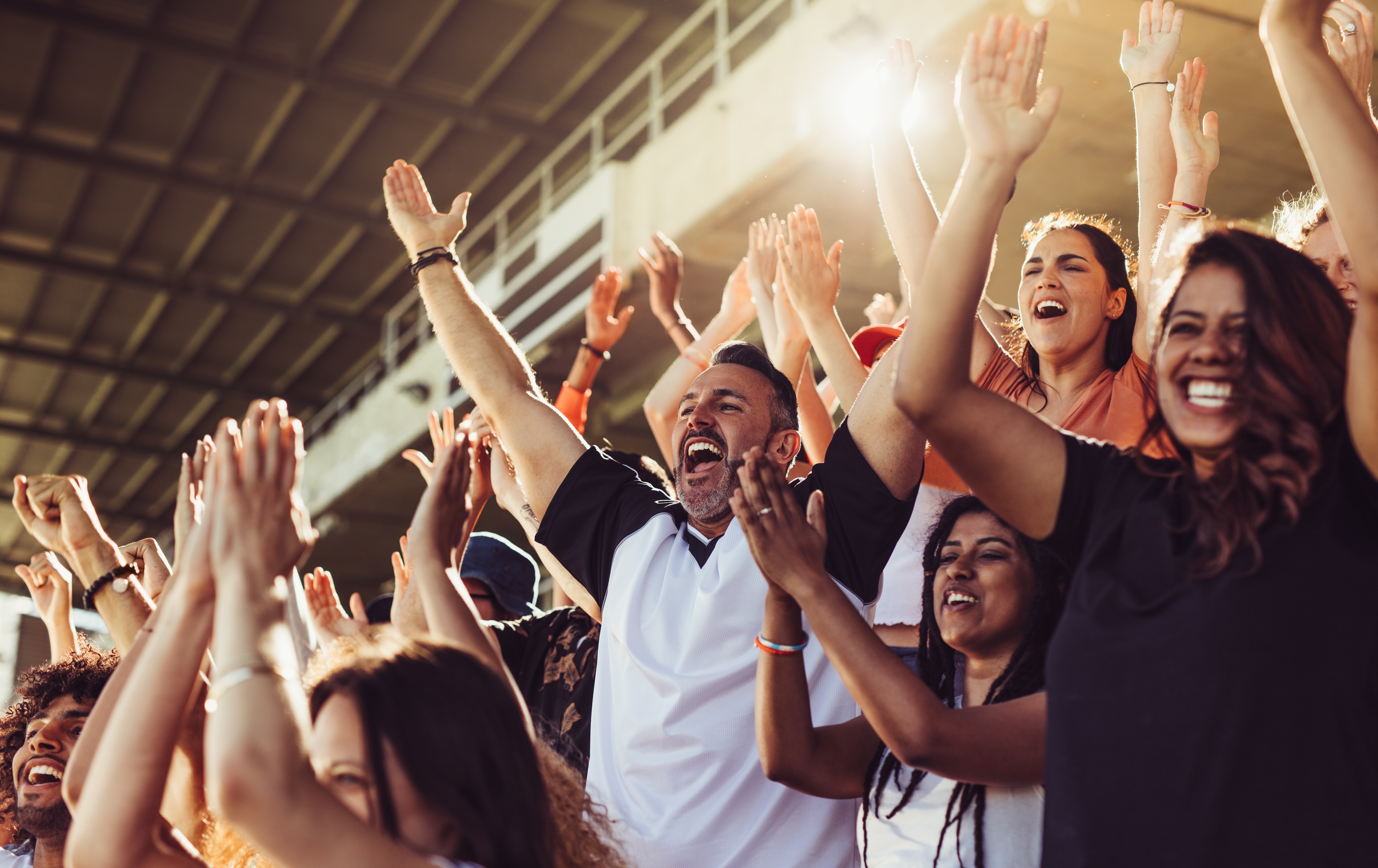 People cheering at game stock image