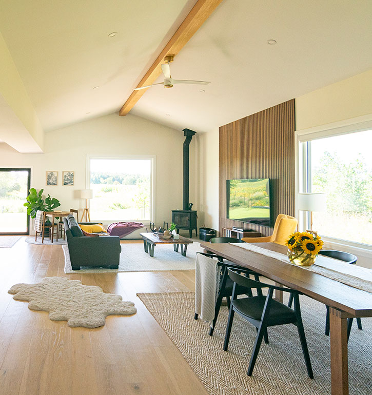 interior of gym area in a home including weight section and indoor basketball court