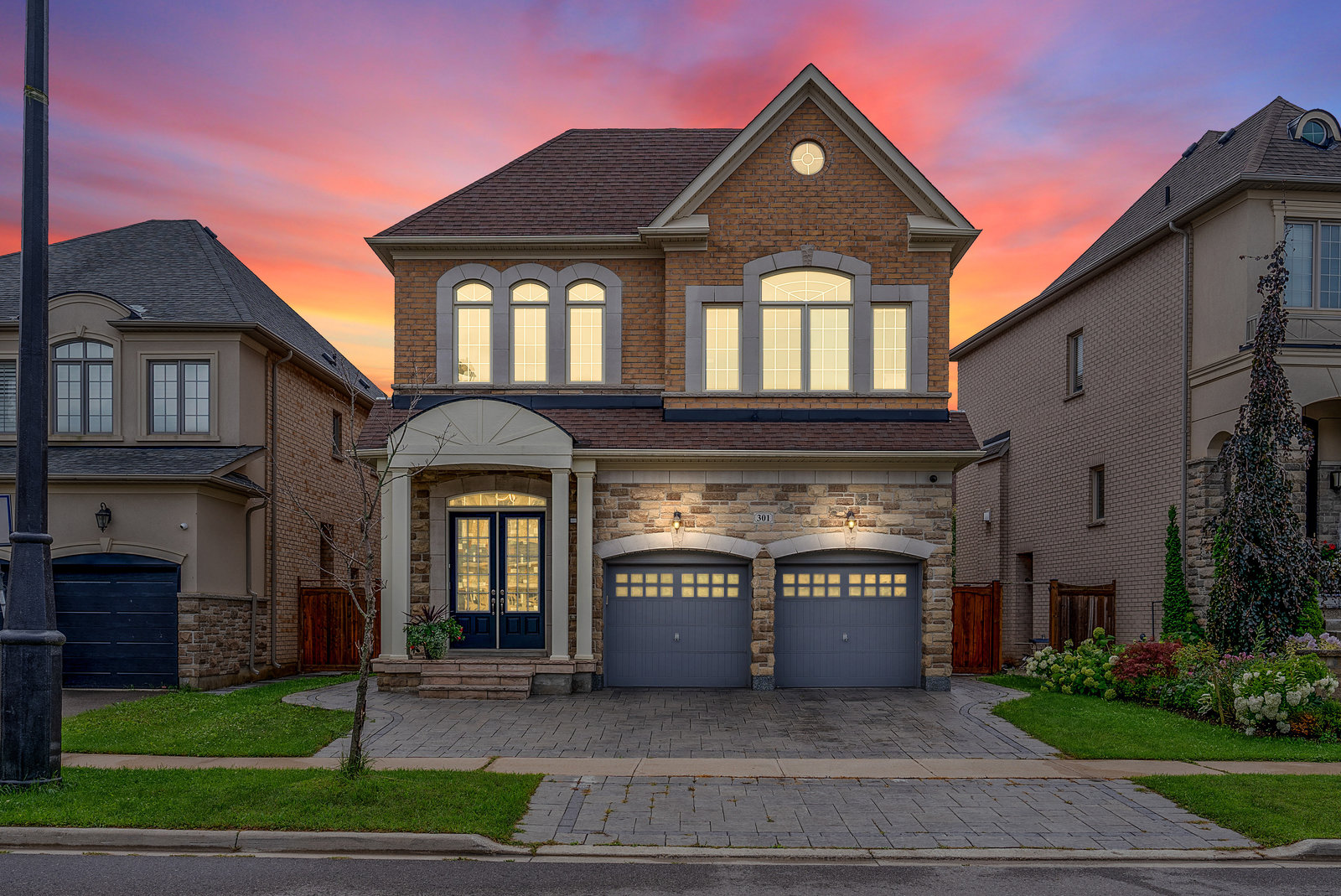 Home exterior at dusk, a recent Ali Khalil listing in the GTA