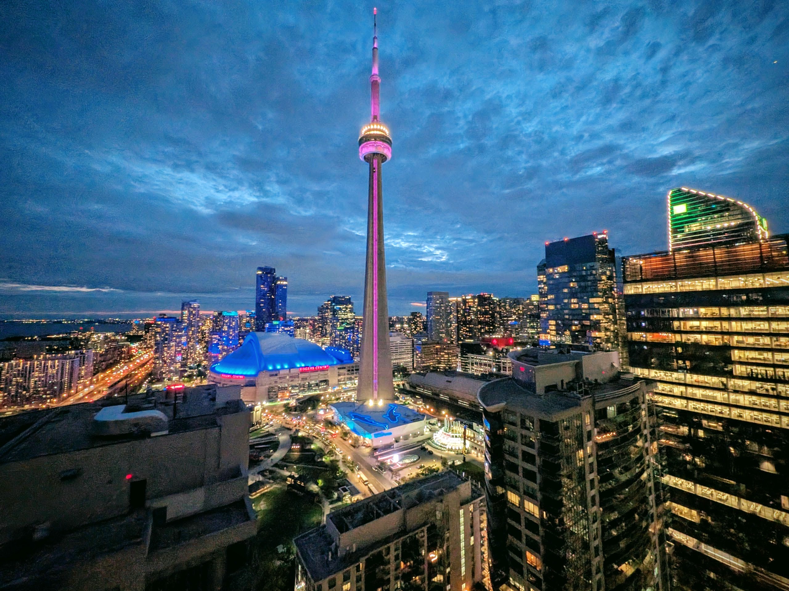 Downtown Toronto skyline at blue hour with the CN Tower lit