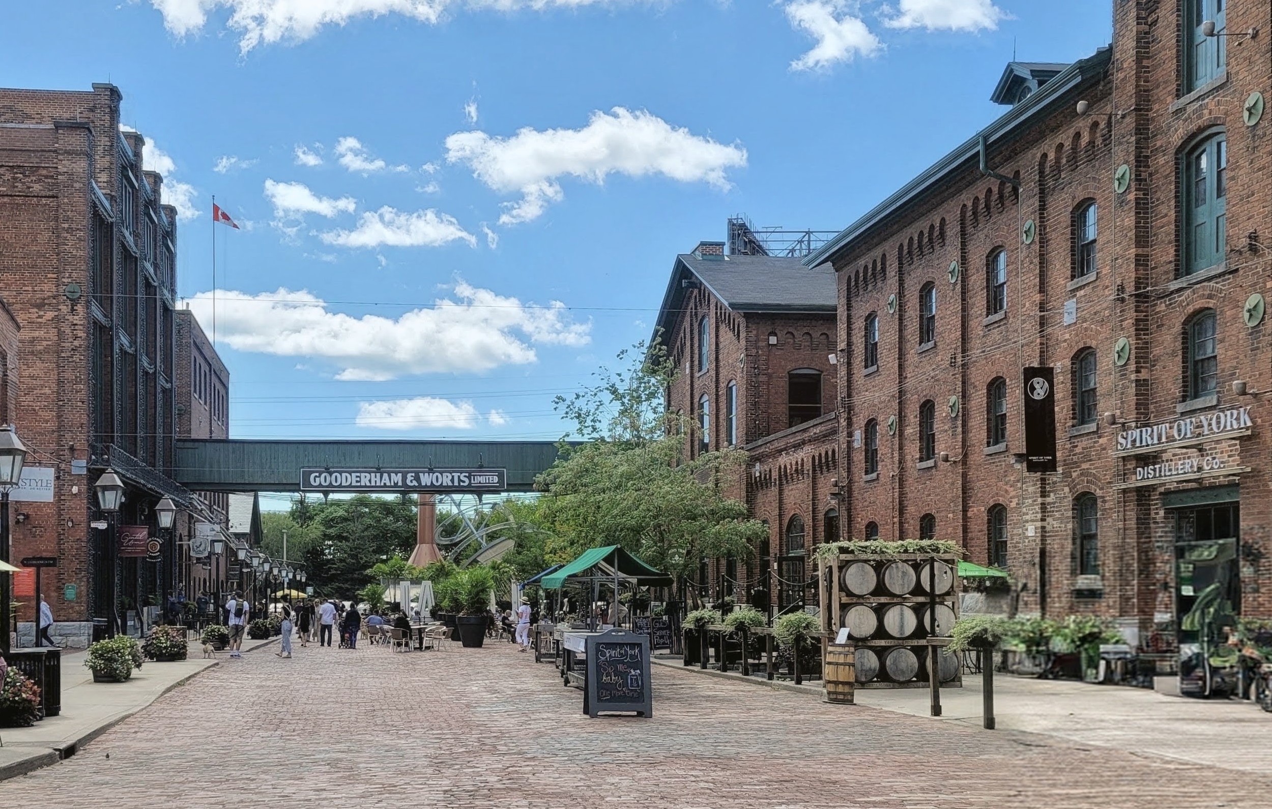 Brick-paved street lined with restored Victorian industrial buildings in Toronto's Distillery District