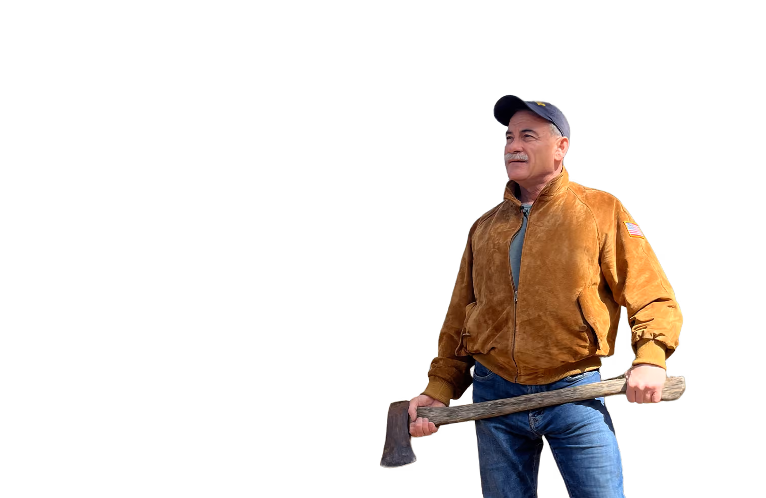 Man in brown jacket and cap holding an axe with both hands, standing against a black background.