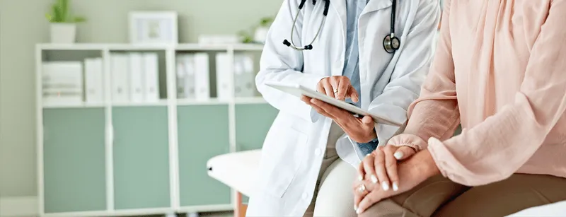 patient consulting with doctor