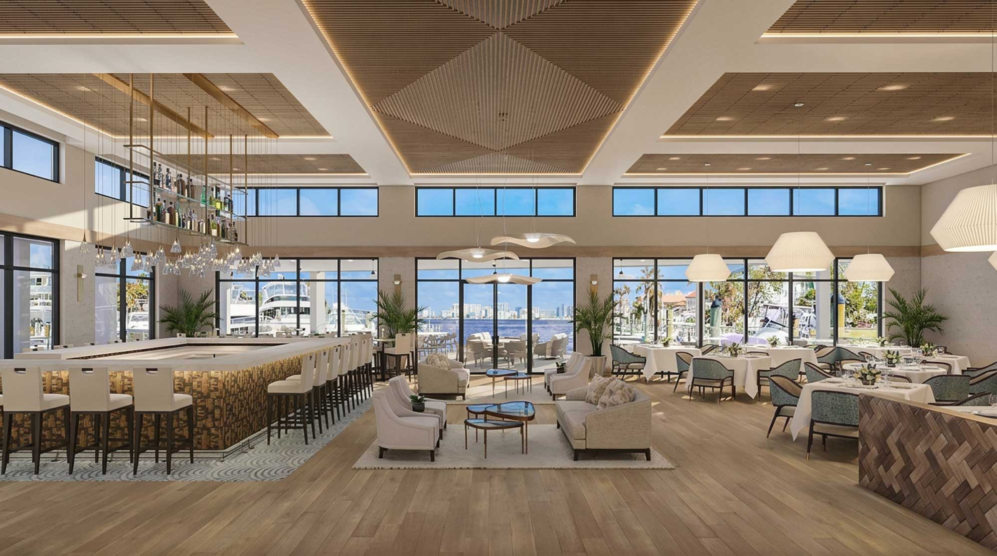 Modern spacious lounge with bar, seating areas, dining tables, large windows, and a water view outside.