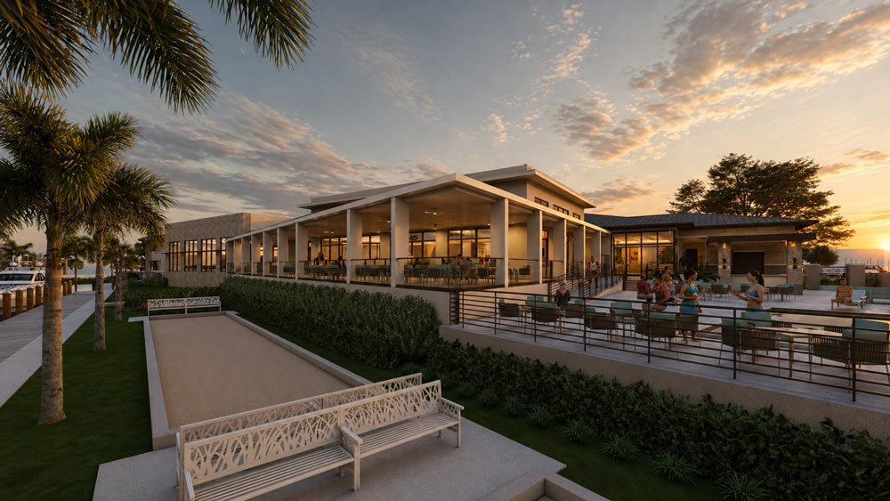 Modern outdoor lounge with patio, seating areas, palm trees, and people enjoying sunset.