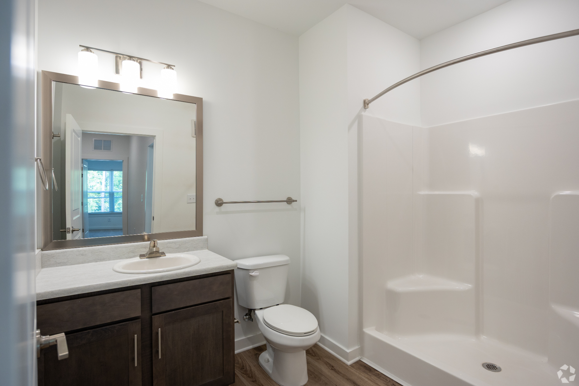 Bathroom with vanity and large shower
