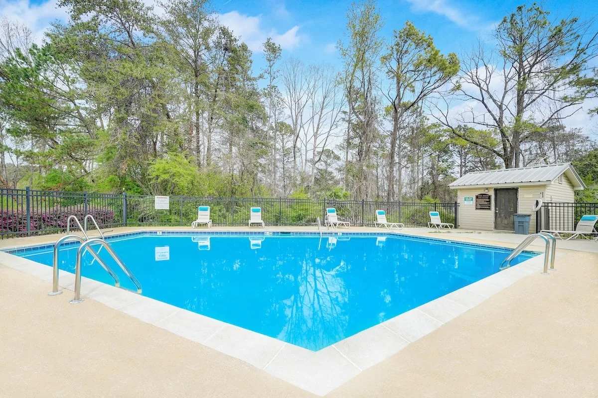 Second pool with wooded backdrop at Hills at Hoover