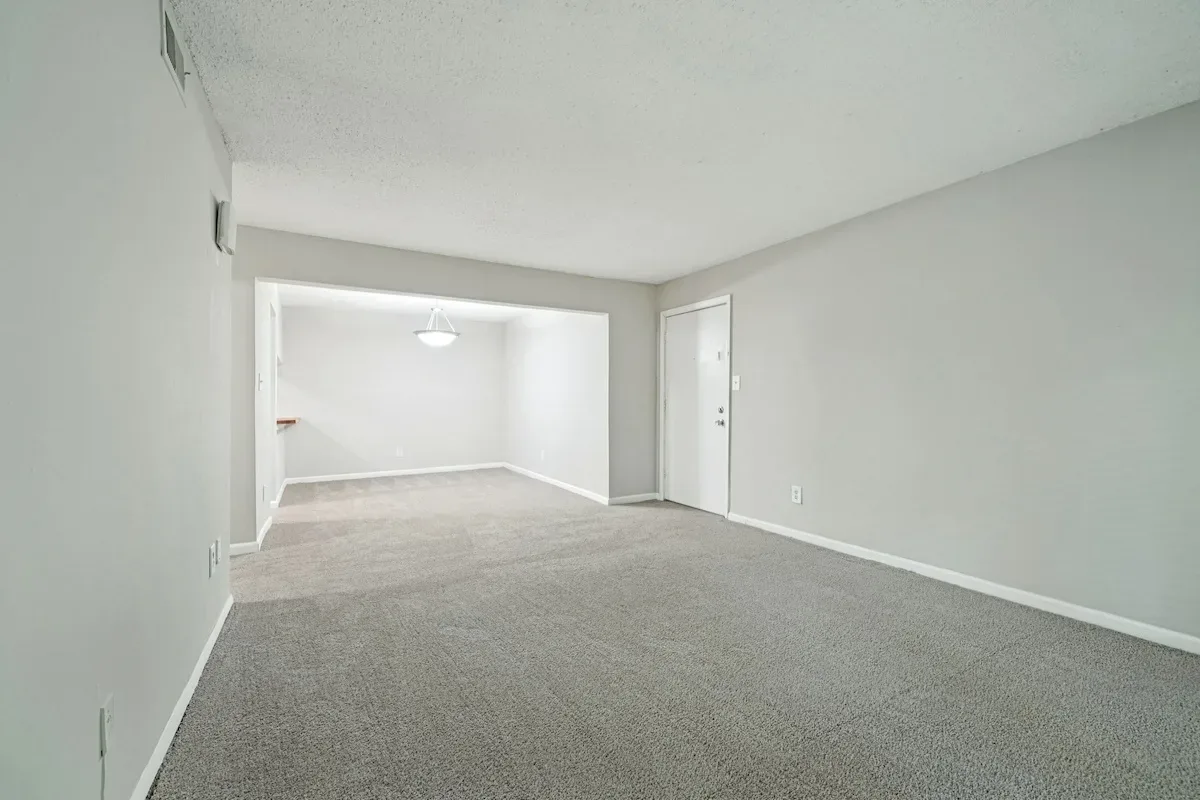 Renovated kitchen with granite countertops and subway tile